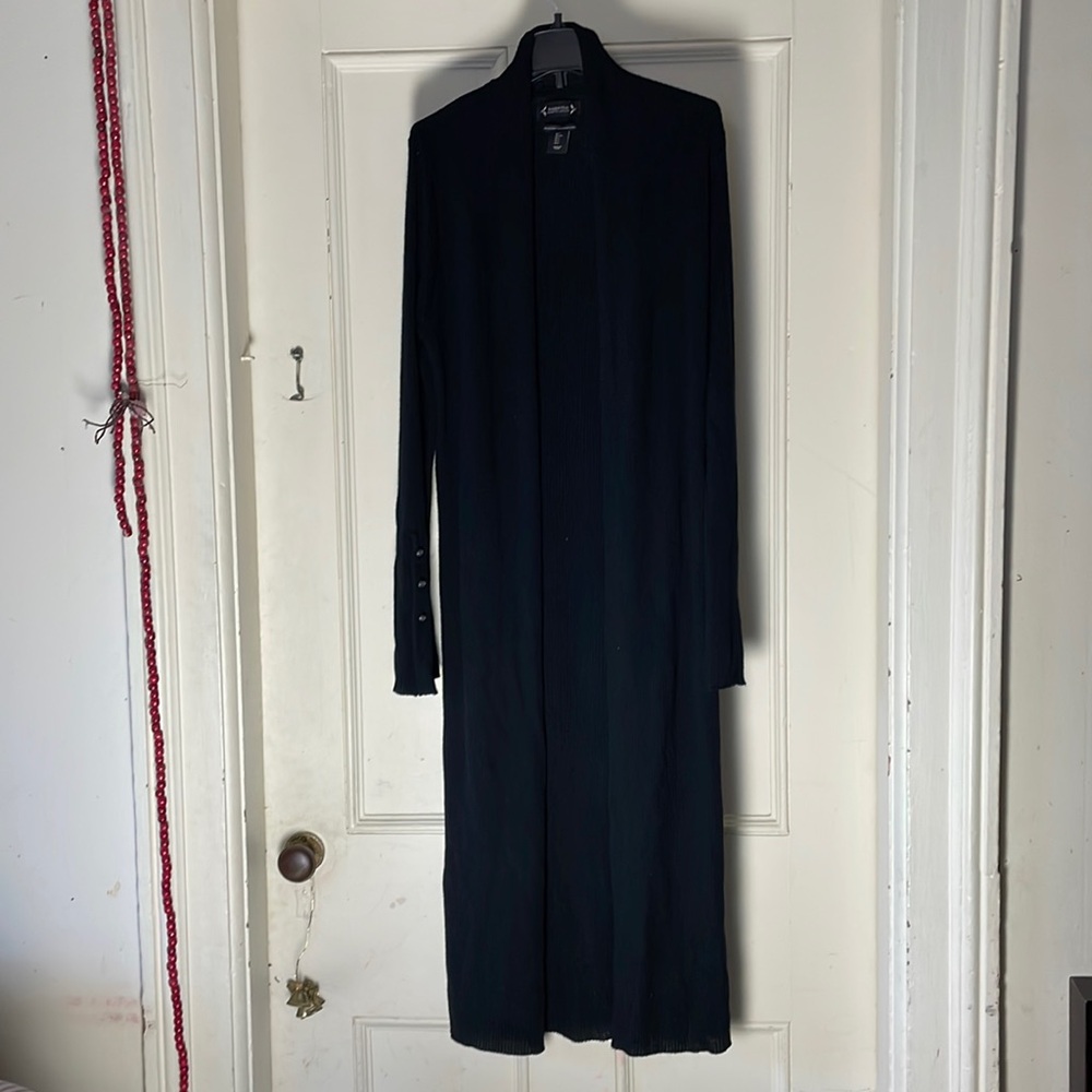 Ladies long swing black wool sweater by Nanette. Size large.